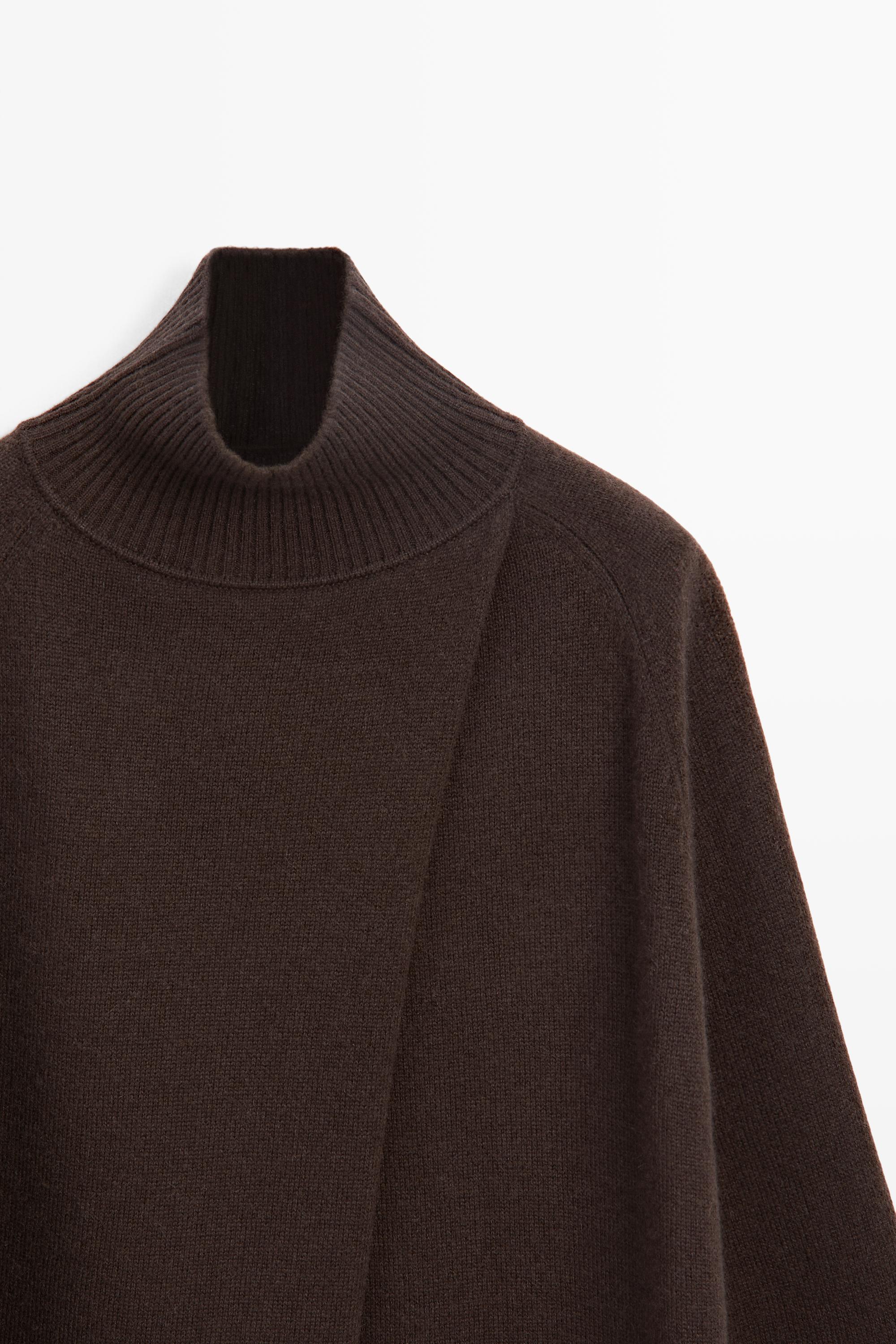 100% cashmere knit cape with crossover detail
